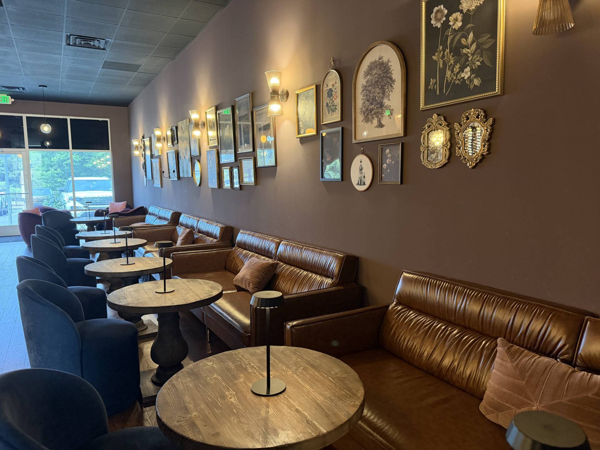Leather couches with wooden tables